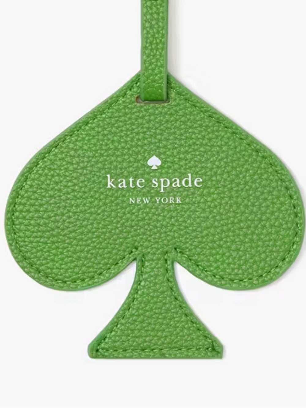 kate spade green spade-shaped luggage tag with strap